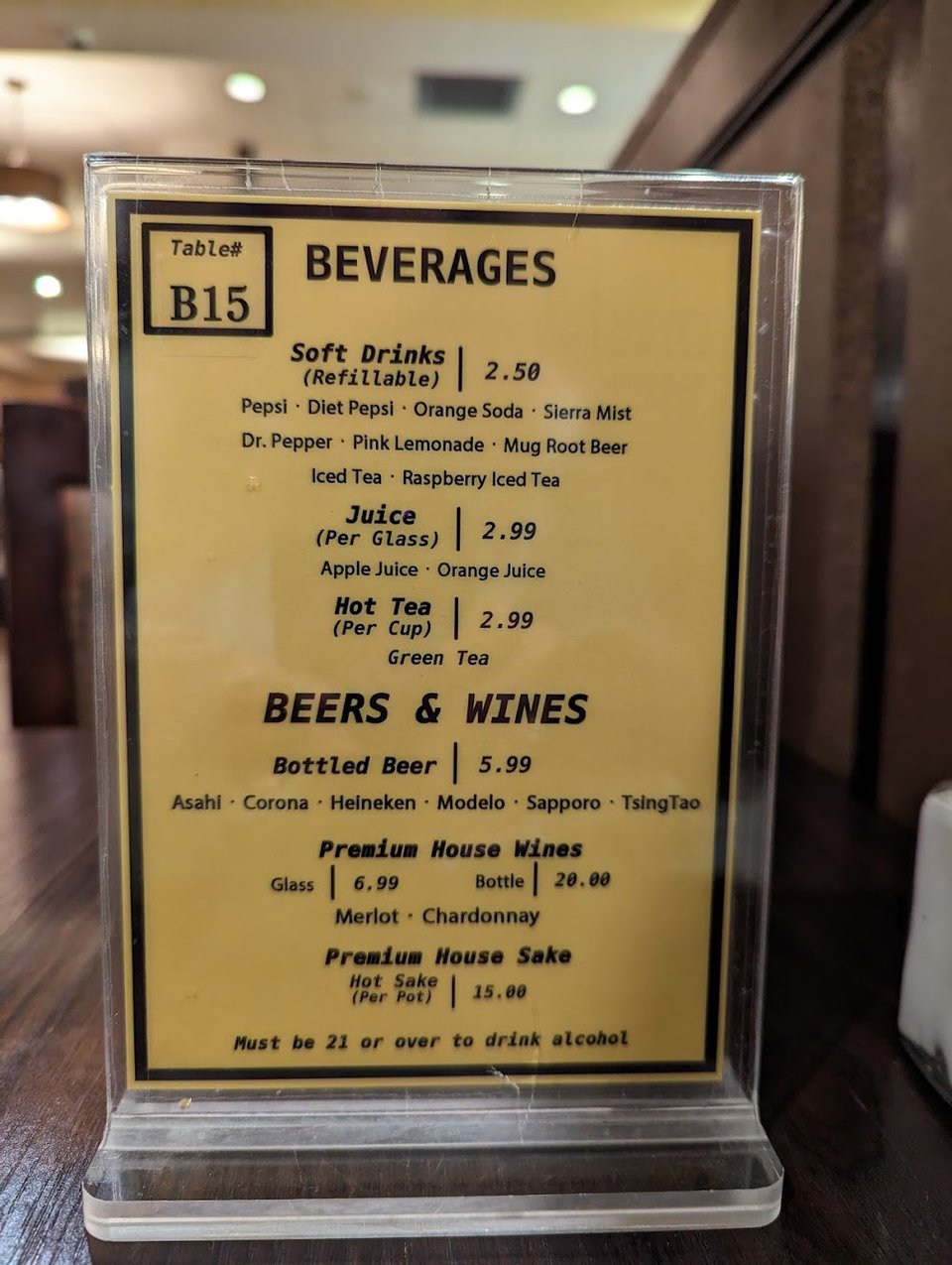Drink list with tea, juice, and wines.